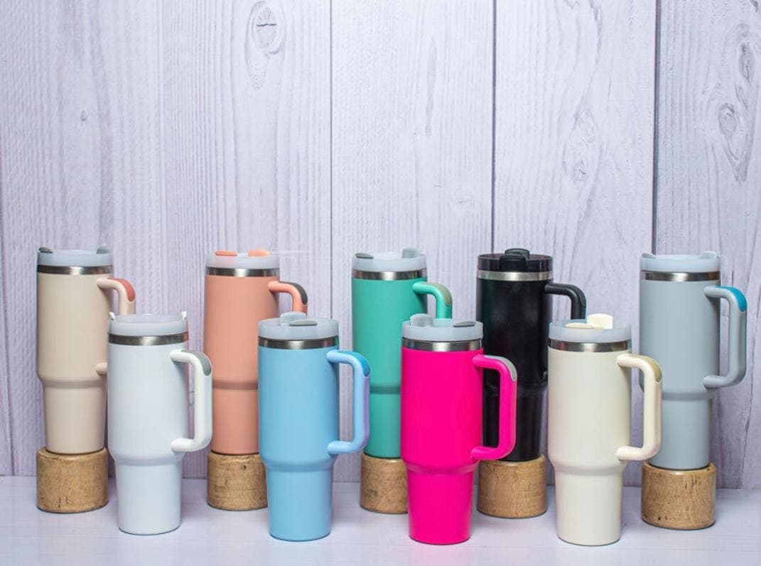 A coordinated collection of premium reusable drinkware in several colors.